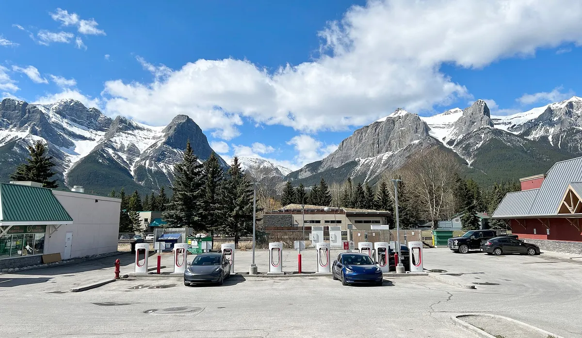 A Tesla at a Supercharger